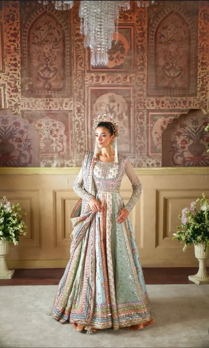 NOMI ANSARI – MARYAM NAWAZ SHARIF clothing in pink, mint tones.